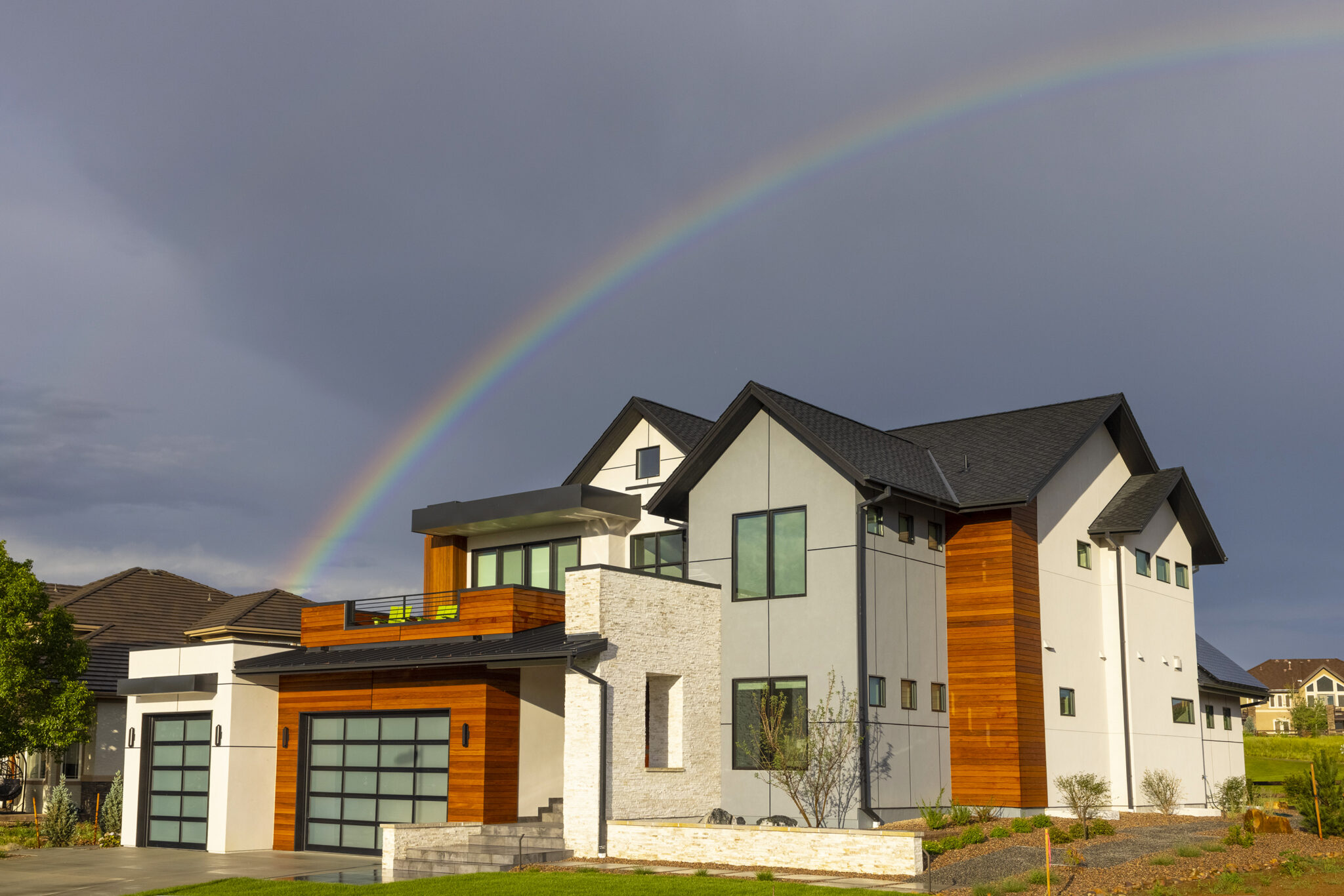 Exterior Shot of Custom Home with Rainbow