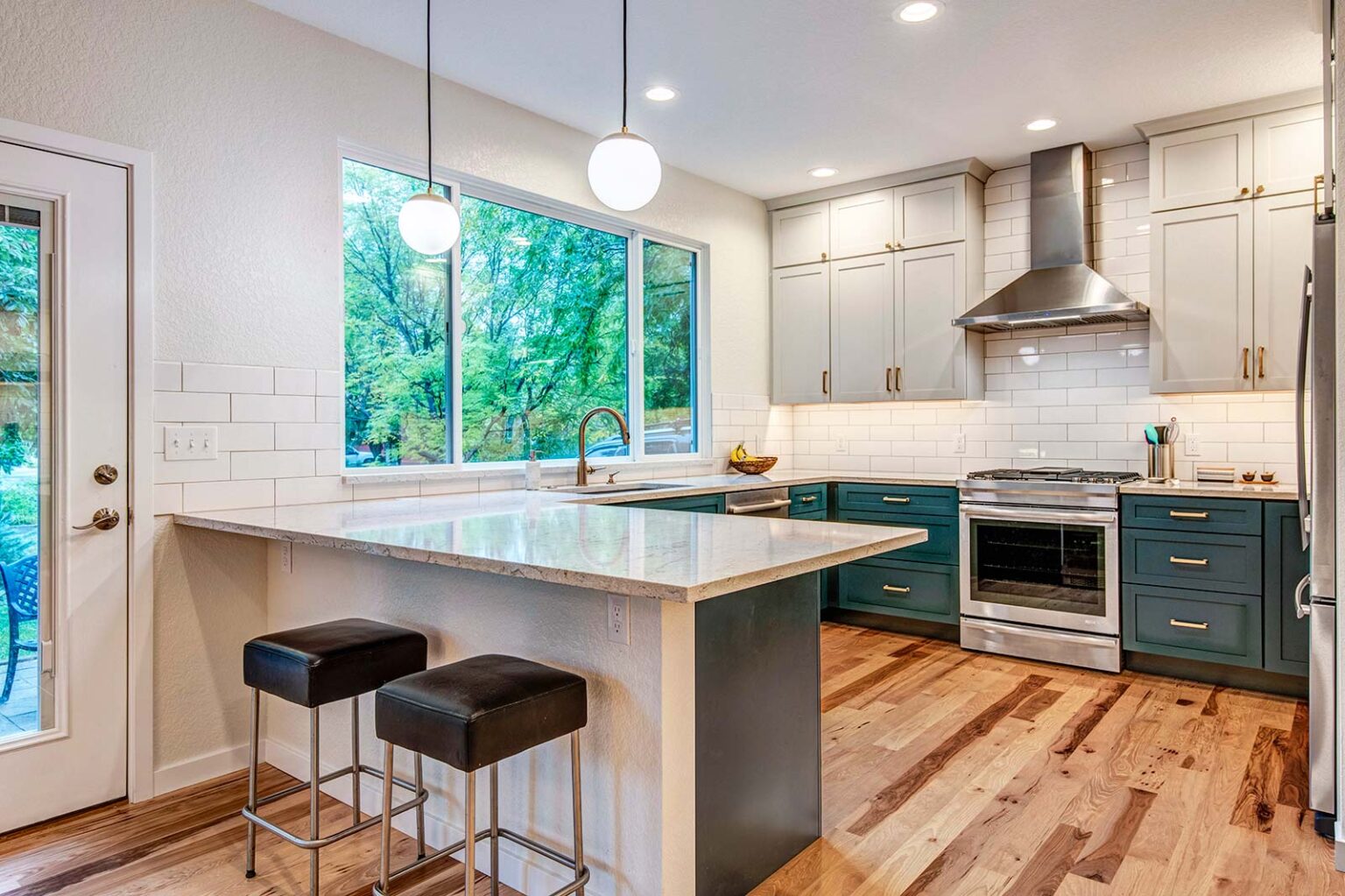 U‑shaped kitchen layout in the Lodgewood custom home designed for efficient cooking and generous counter space