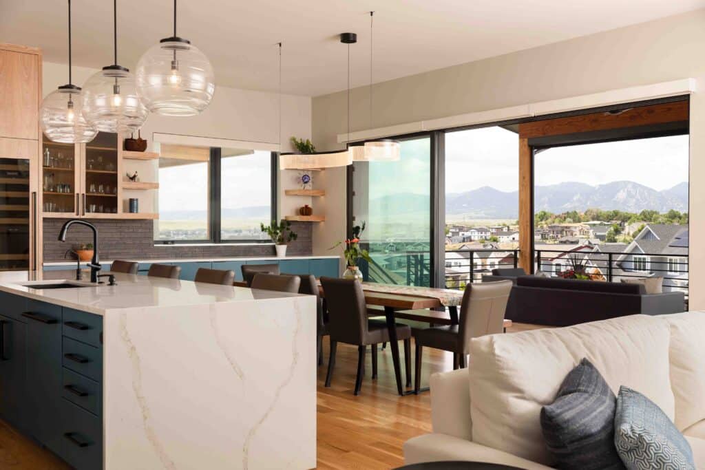 Dining room in a Trail Ridge custom home designed for intelligent living with open layout, modern finishes, and integrated smart lighting