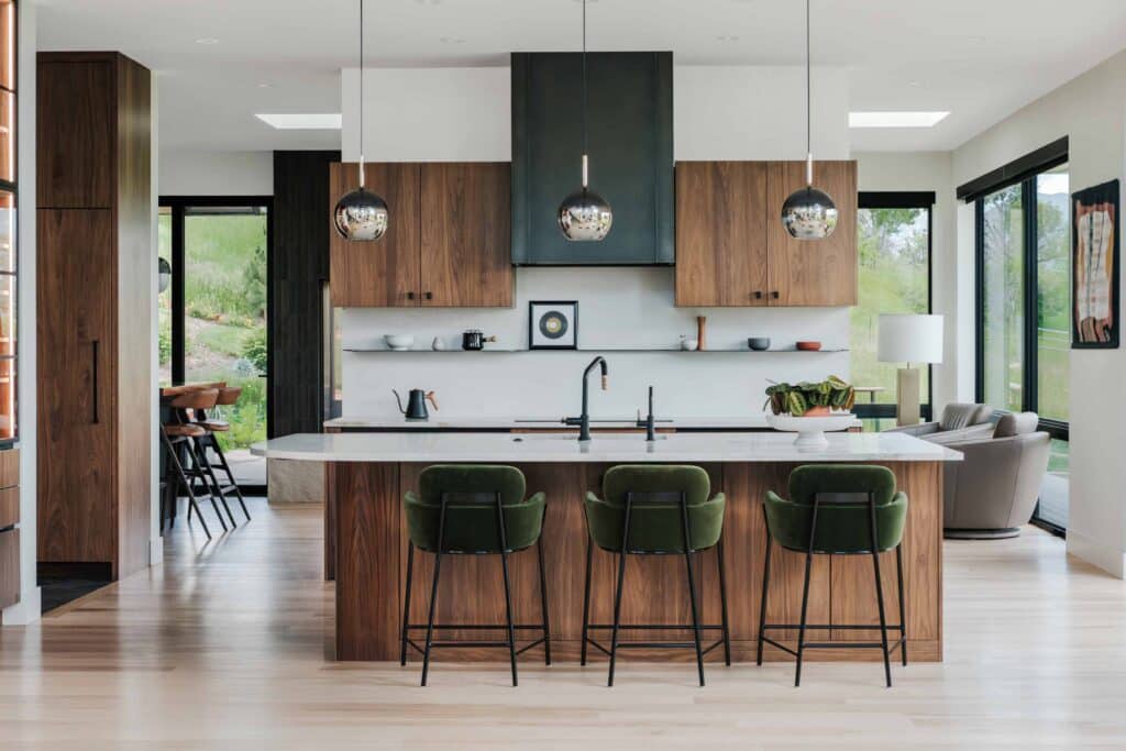 Custom home kitchen with walnut cabinetry built by Built By Krueger in Northern Colorado