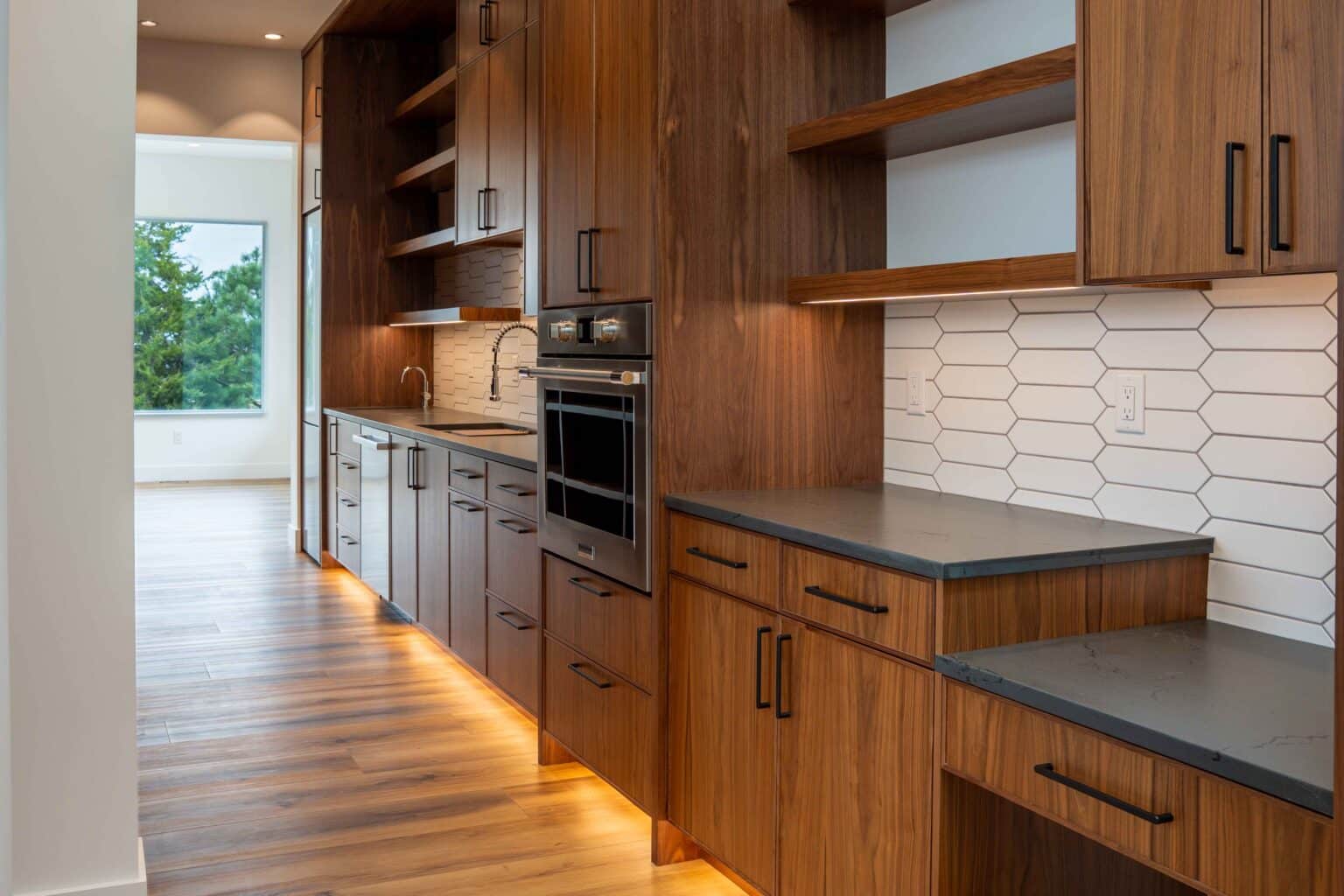 Galley kitchen layout in a Lafayette custom home remodel designed for efficient workflow and prep space